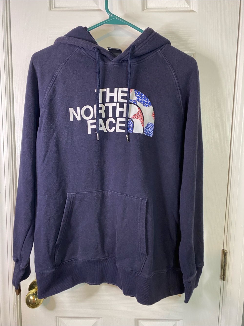 The North Face Navy Blue Pullover Hoodie with Patterned Logo Size Medium. - Picture 1 of 7